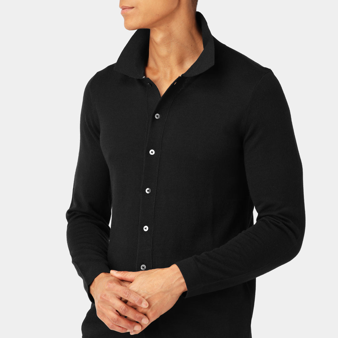 Discover the Navy shirt cardigan for men, a timeless and versatile piece crafted from a premium merino wool blend.