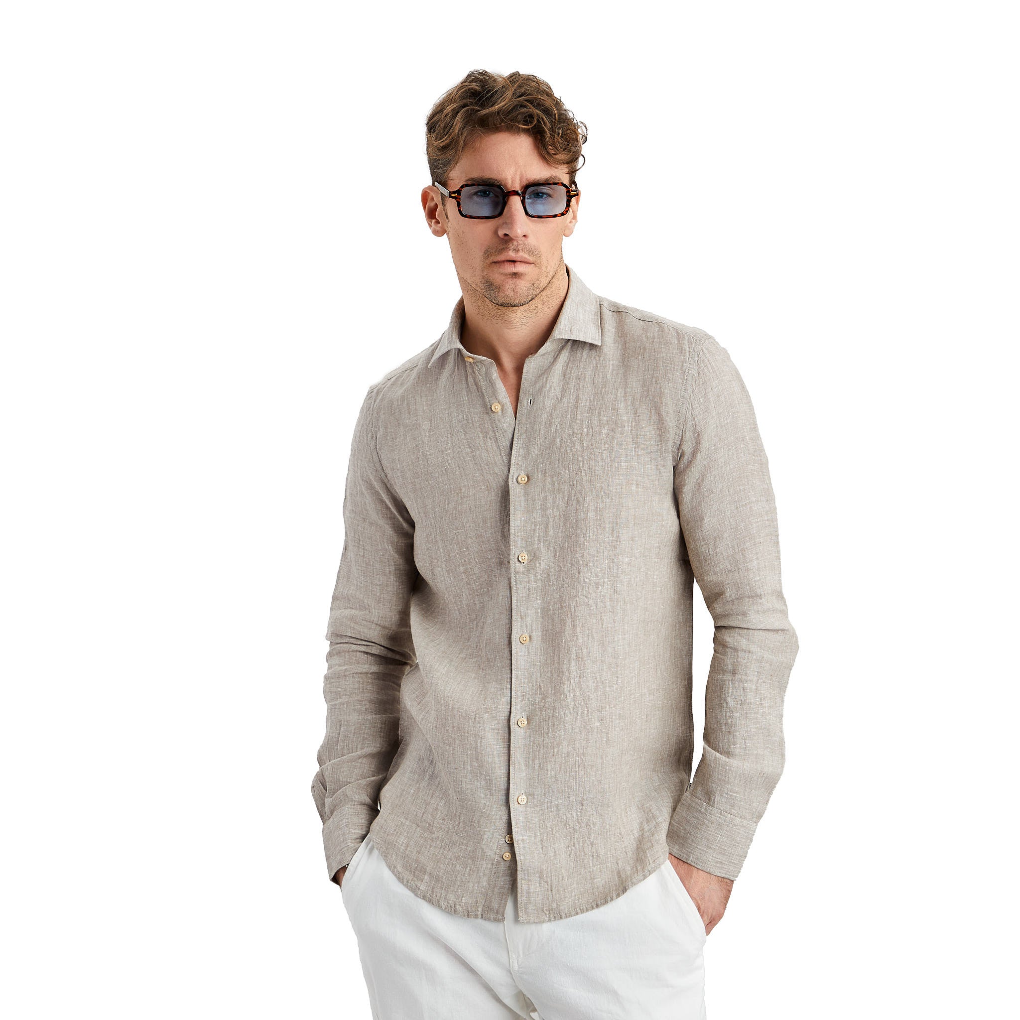 A beige linen shirt always stays trendy in summer.